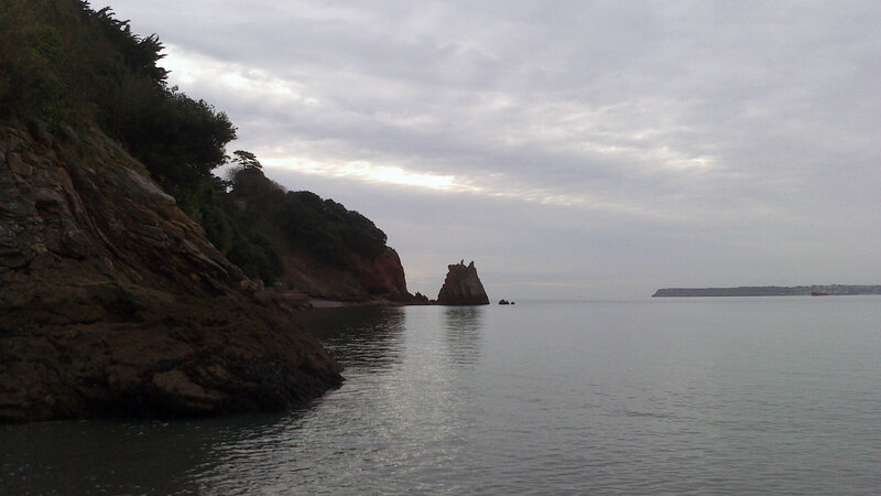 Rocky Coastline at Sea — Gray, Calm