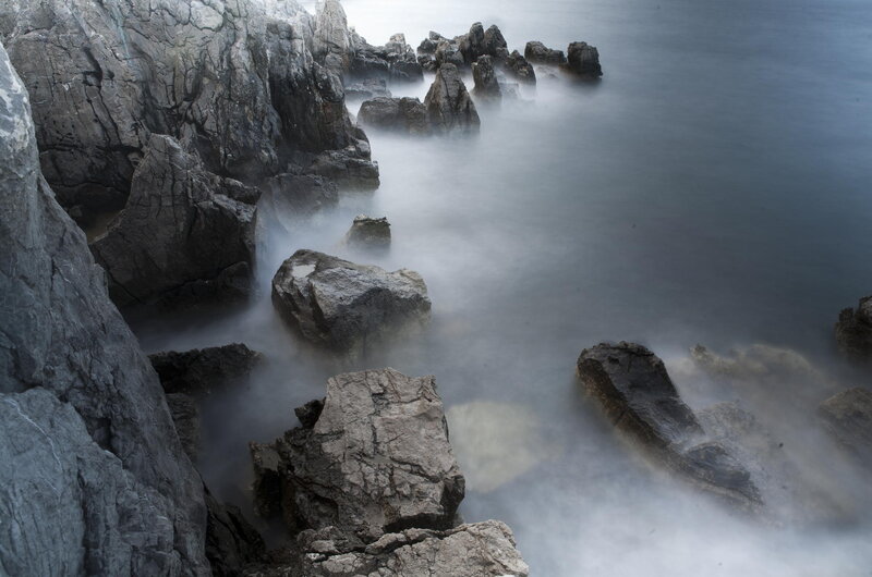 Rocky Coastline at Sea — Gray, Serene