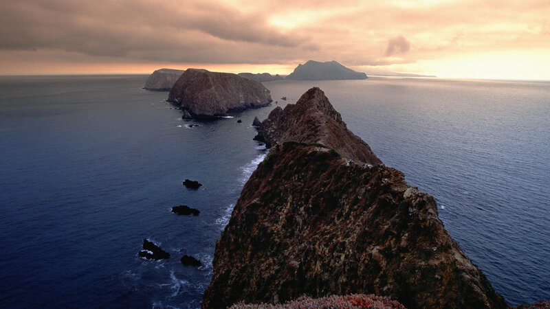 Rocky Coastline at Sunset — Blue, Dramatic, Photograph, Ocean, Island, Clouds