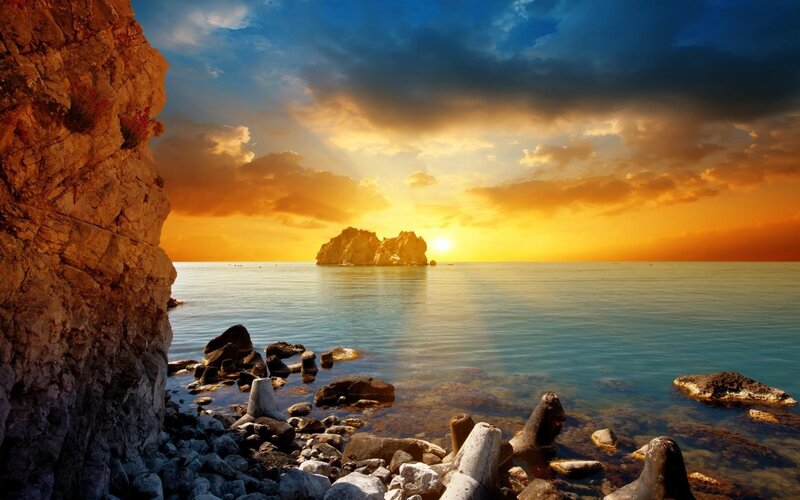 Rocky Coastline at Sunset — Blue, Dramatic, Photograph, Sea, Island, Clouds