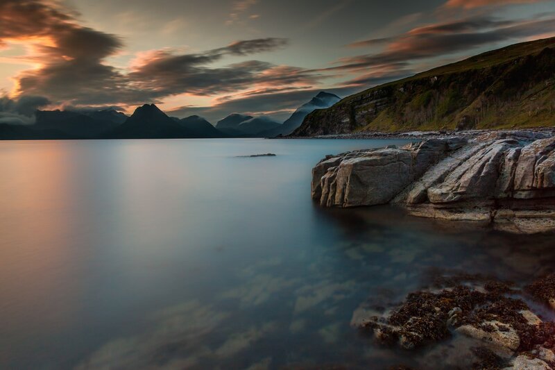 Rocky Coastline at Sunset — Blue, Serene, Photograph, Mountains, Water