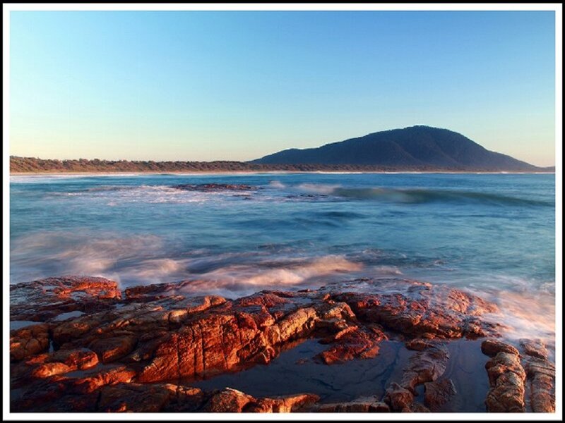 Rocky Coastline at Sunset — Blue, Serene, Photograph, Ocean, Mountain