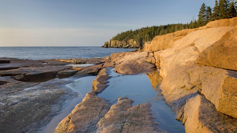 Rocky Coastline at Sunset — Blue, Serene, Photograph, Ocean, Trees, Rocks