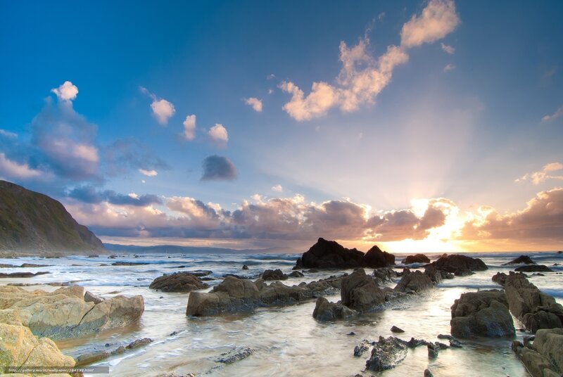 Rocky Coastline at Sunset — Blue, Serene, Photograph, Rocks, Ocean, Clouds