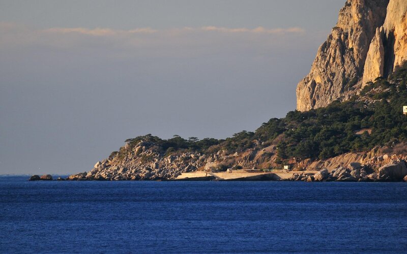 Rocky Coastline at Sunset — Blue, Serene, Photograph, Sea, Cliff