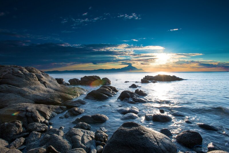 Rocky Coastline at Sunset — Blue, Serene, Photograph, Sea, Mountain
