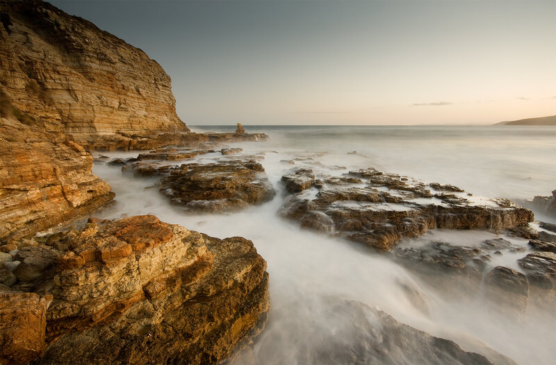 Rocky Coastline at Sunset — Brown, Serene, Photograph, Cliffs