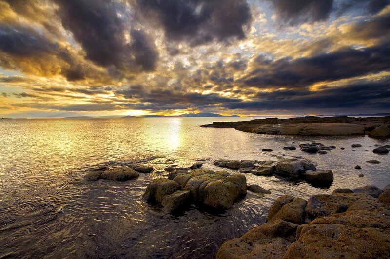 Rocky Coastline at Sunset — Gold