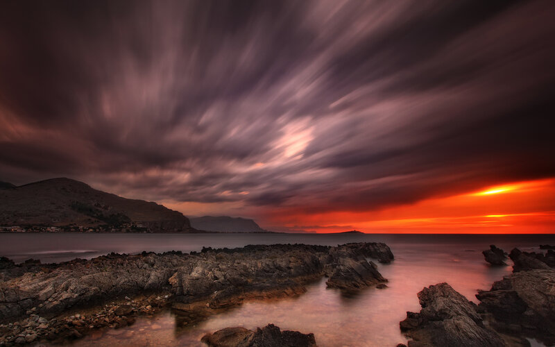 Rocky Coastline at Sunset — Orange, Dramatic, Photograph, Mountain