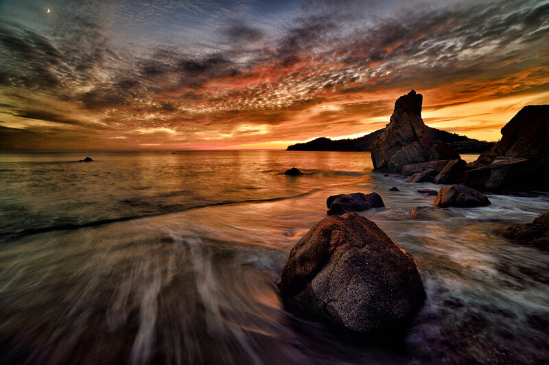Rocky Coastline at Sunset — Orange, Dramatic, Photograph, Rocks, Sea, Sky, Moon