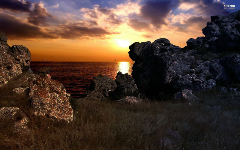 Rocky Coastline at Sunset — Orange, Dramatic, Photograph, Sea, Sky, Clouds