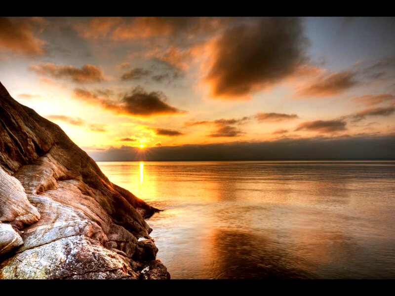 Rocky Coastline at Sunset — Orange, Dramatic, Photograph, Sun, Sea, Clouds