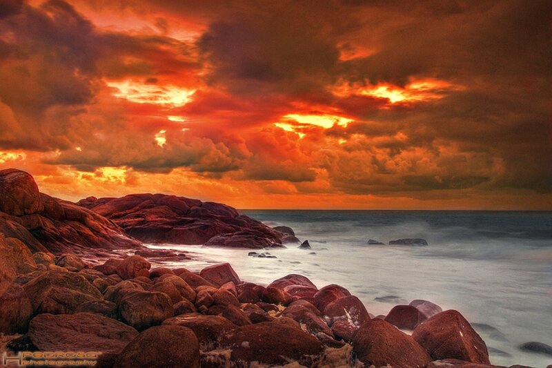 Rocky Coastline at Sunset — Orange, Dramatic, Photograph