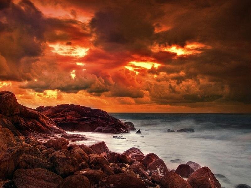 Rocky Coastline at Sunset — Orange, Dramatic