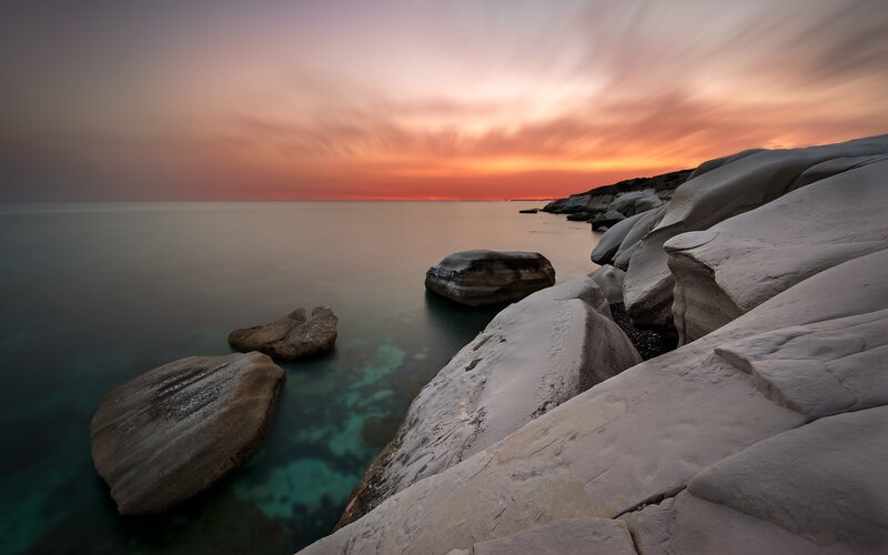 Rocky Coastline at Sunset — Orange, Photograph