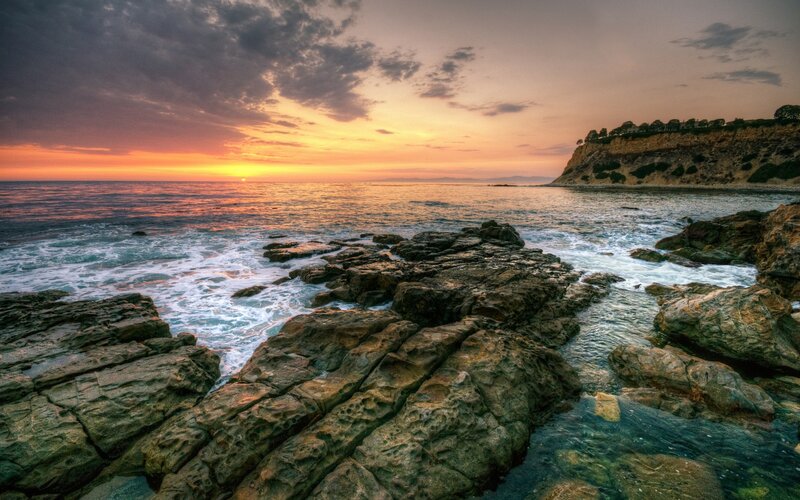 Rocky Coastline at Sunset — Orange, Serene, Photograph, Ocean, Cliff