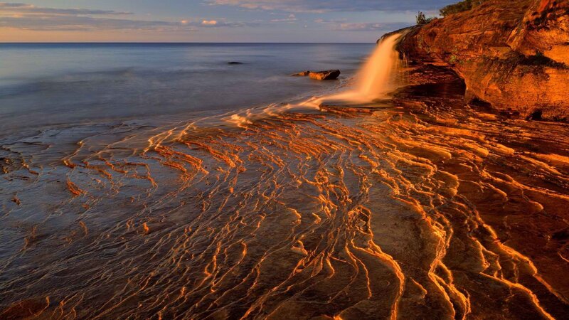 Rocky Coastline at Sunset — Orange, Serene, Photograph, Ocean, Cliff, Waterfall