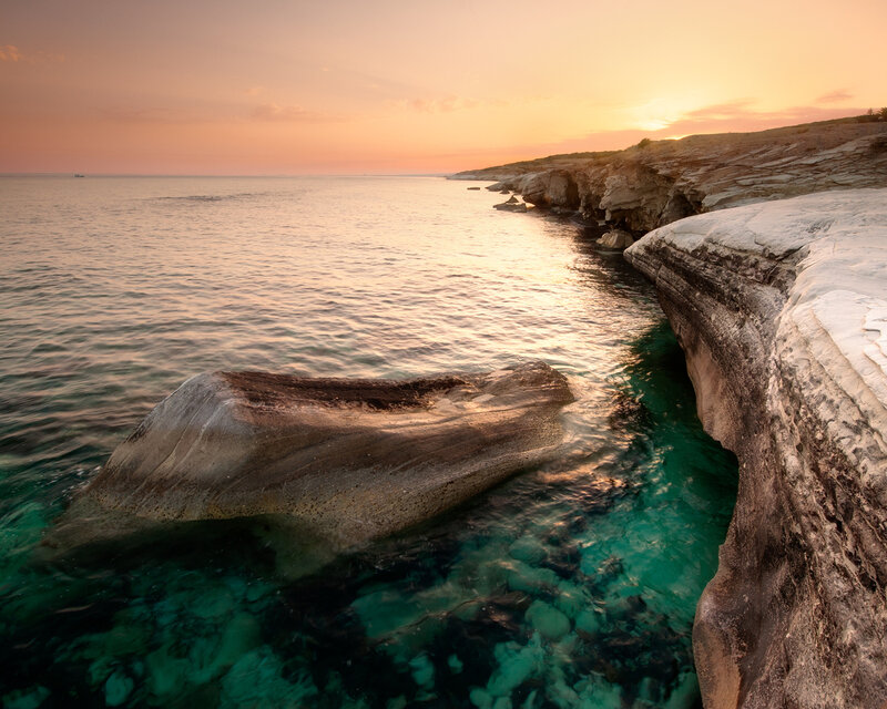 Rocky Coastline at Sunset — Orange, Serene, Photograph, Ocean, Sky, Rocks