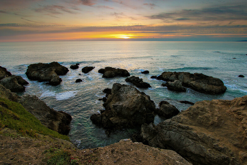 Rocky Coastline at Sunset — Orange, Serene, Photograph, Rocks, Ocean, Sky