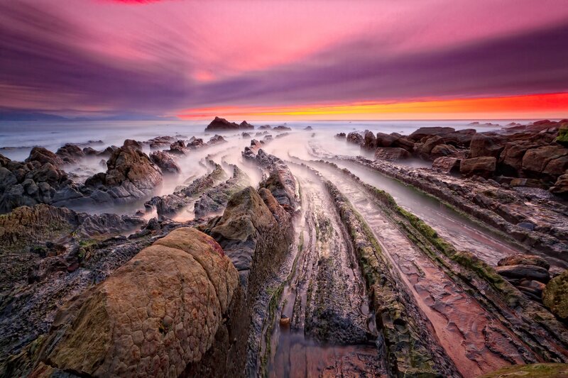 Rocky Coastline at Sunset — Pink, Dramatic, Photograph