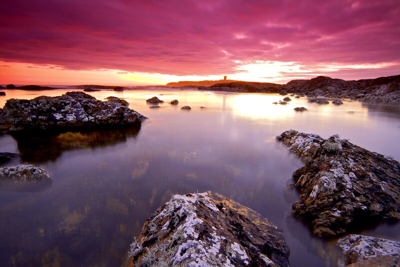 Rocky Coastline at Sunset — Purple, Dramatic, Photograph, Rocks, Sea, Sky, Lighthouse