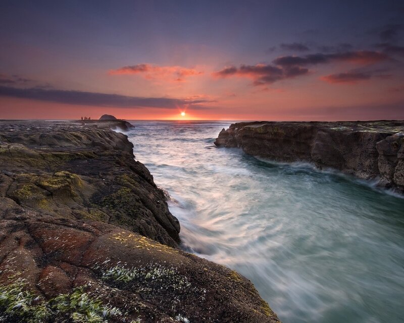 Rocky Coastline at Sunset — Purple, Dramatic, Photograph, Sun, Ocean, Rocks, People
