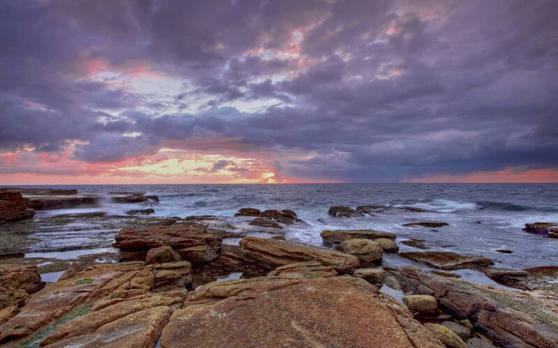 Rocky Coastline at Sunset — Purple, Dramatic, Photograph