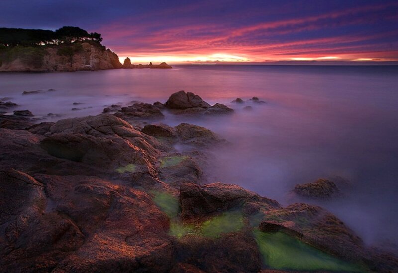 Rocky Coastline at Sunset — Purple, Dramatic