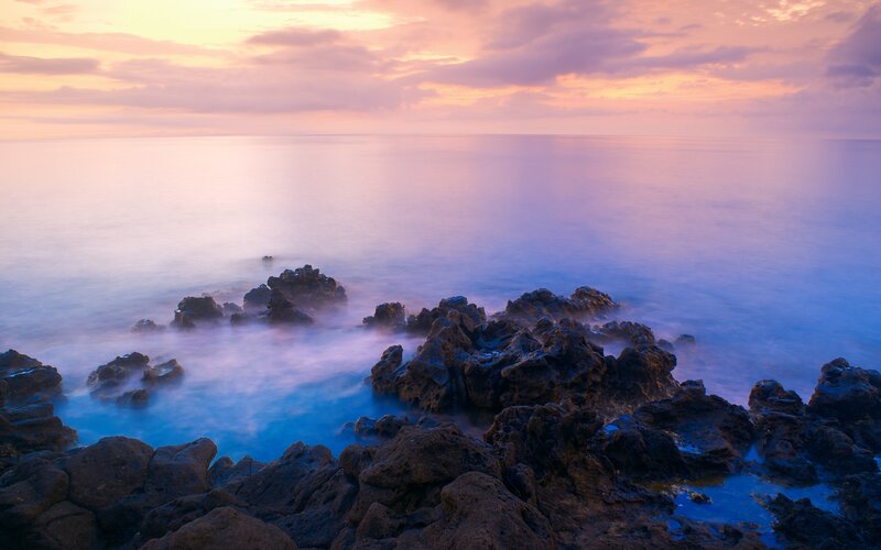 Rocky Coastline at Sunset — Purple