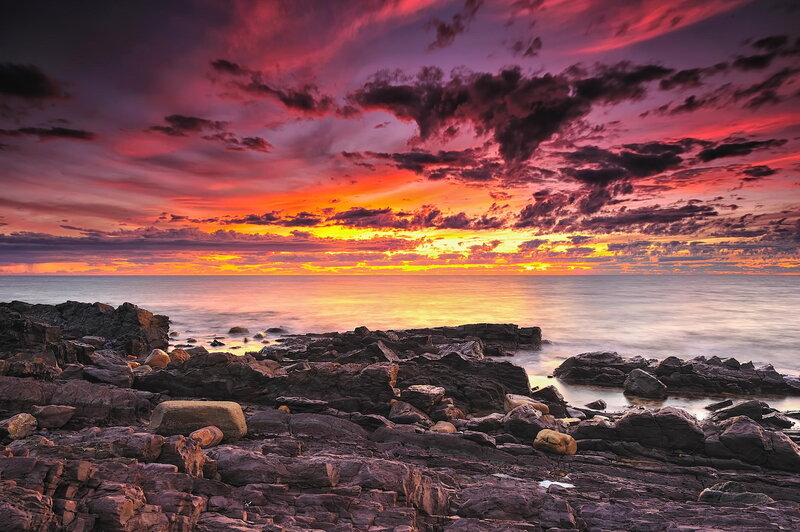 Rocky Coastline at Sunset — Red, Dramatic, Photograph, Ocean, Sky, Clouds