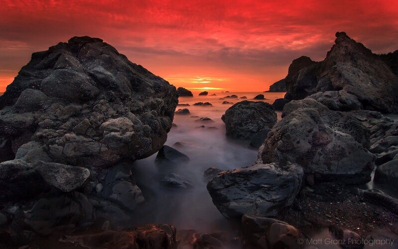Rocky Coastline at Sunset — Red, Dramatic, Photograph, Rocks, Ocean, Sky, Orange, Black