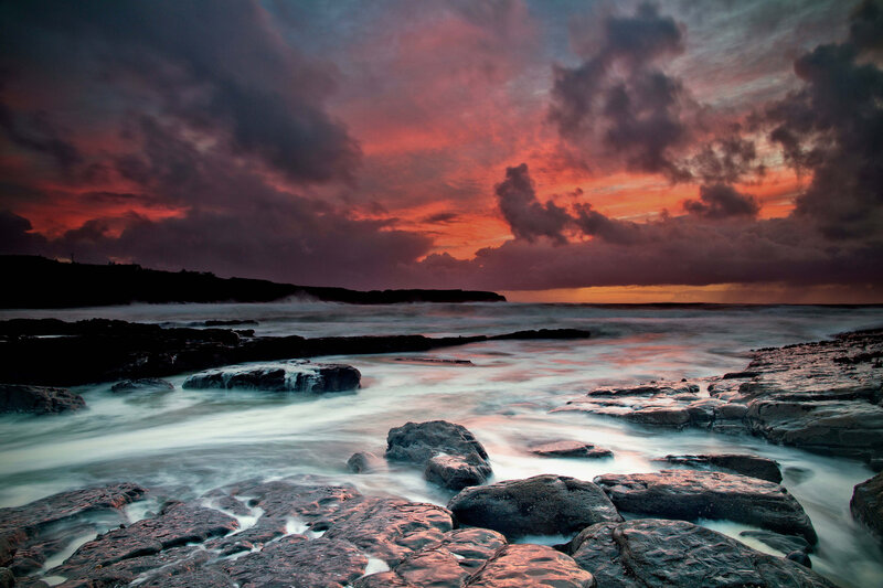 Rocky Coastline at Sunset — Red, Dramatic, Photograph, Rocks
