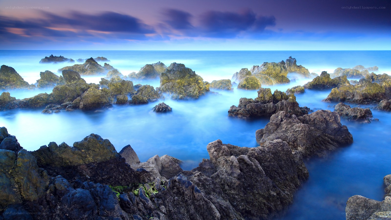 Rocky coastline at twilight