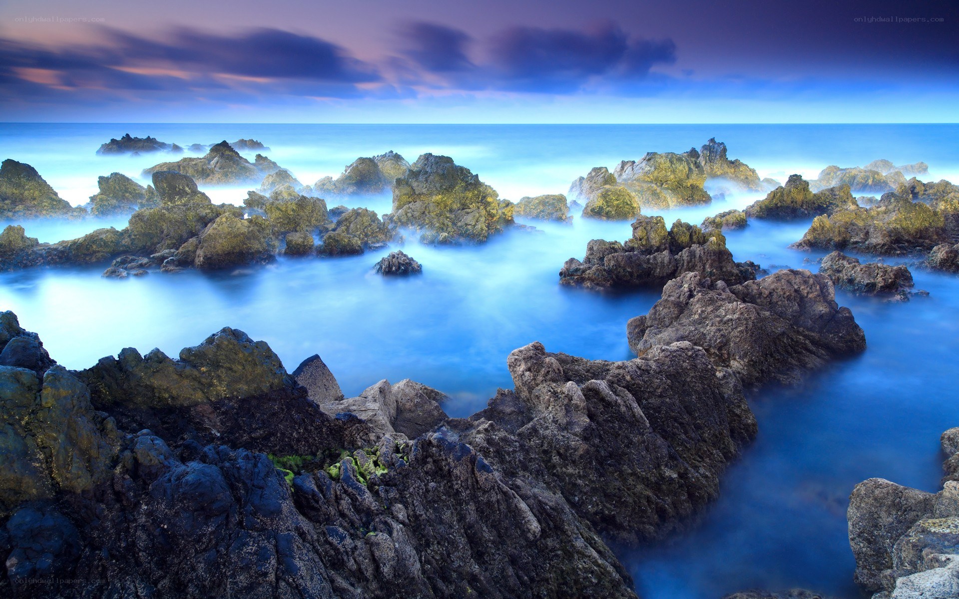 Rocky coastline at twilight