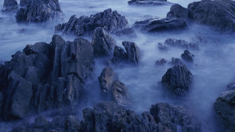 Rocky coastline at twilight