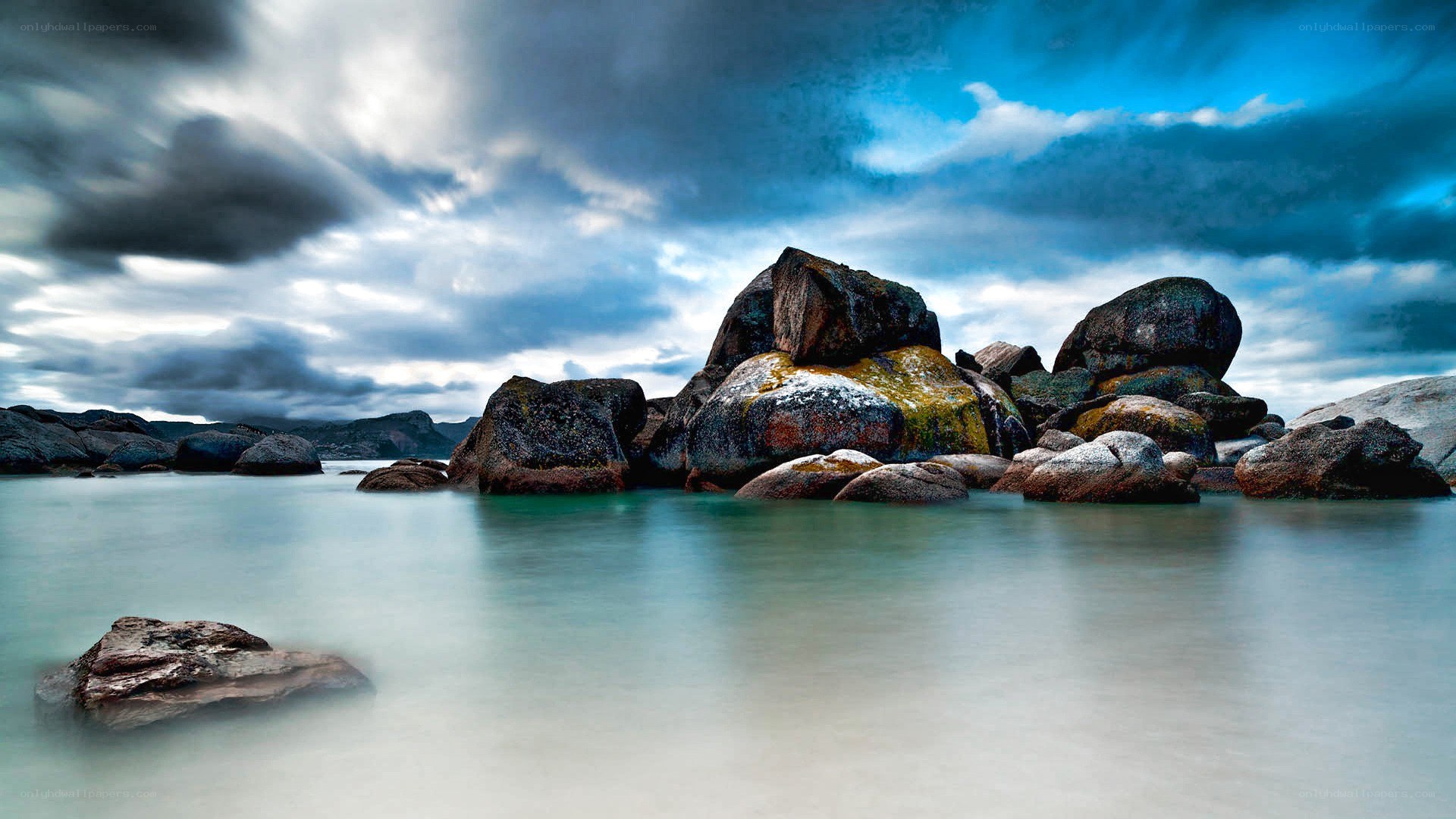Rocky coastline under stormy sky