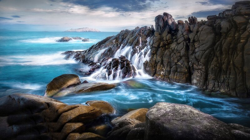 Rocky Coastline Waterfall — Blue