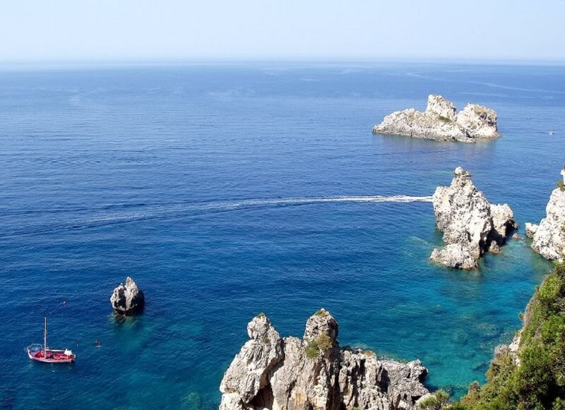 Rocky Coastline with Boats