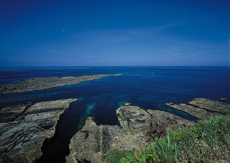 Rocky coastline with clear blue sea