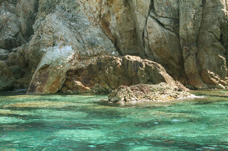 Rocky Coastline with Clear Water — Green