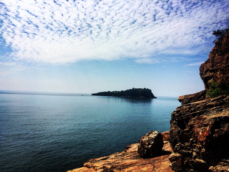 Rocky Coastline with Island — Blue, Serene