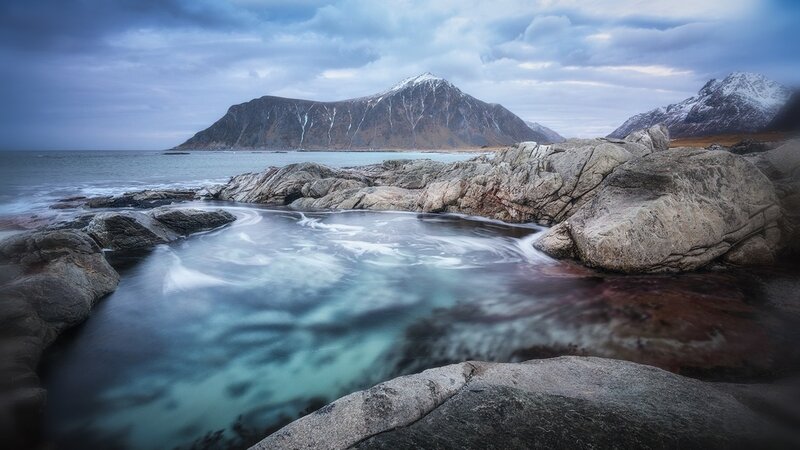 Rocky Coastline with Mountains — Blue, Dramatic, Photograph