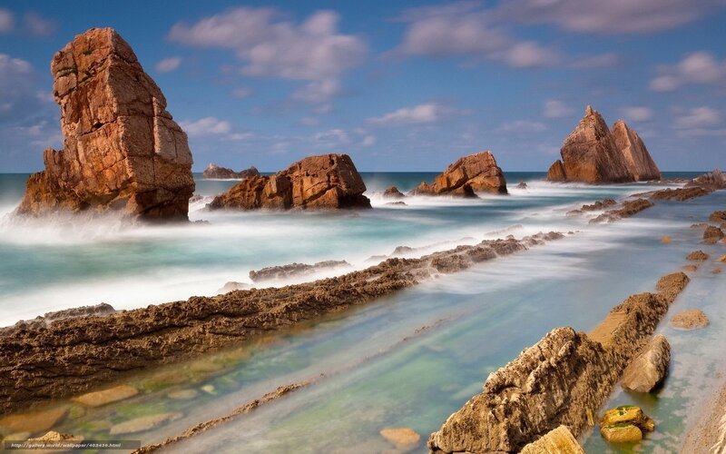Rocky coastline with sea waves