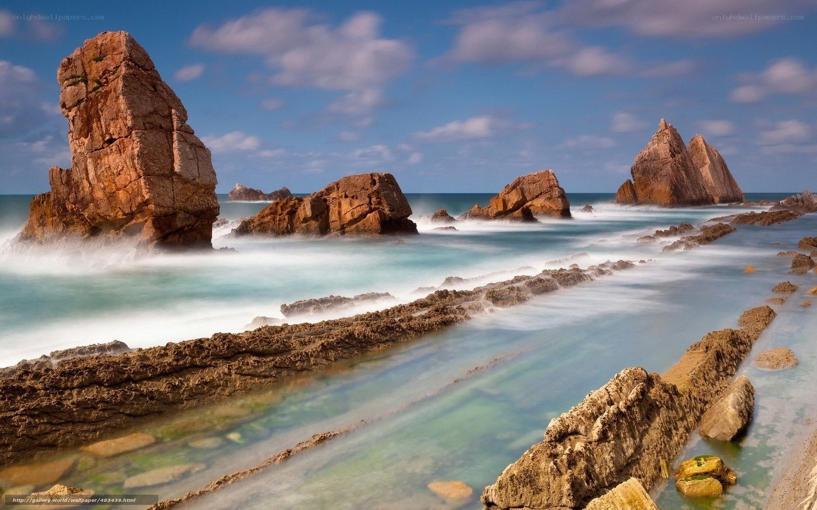 Rocky coastline with sea waves