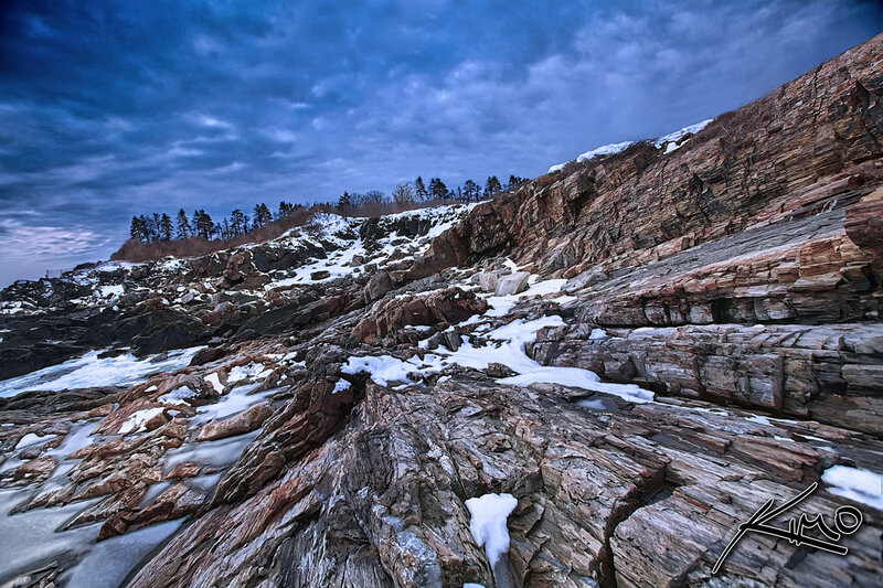 Rocky Coastline with Snow
