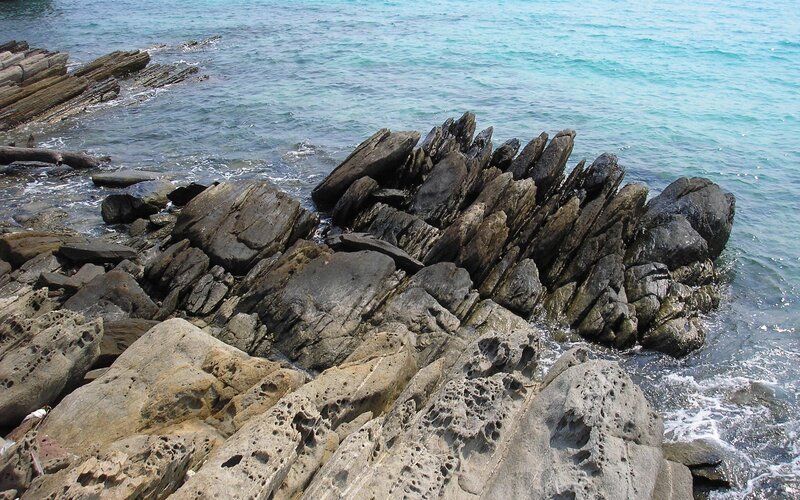 rocky coastline with turquoise water