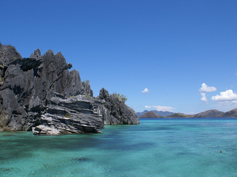 rocky coastline with turquoise water