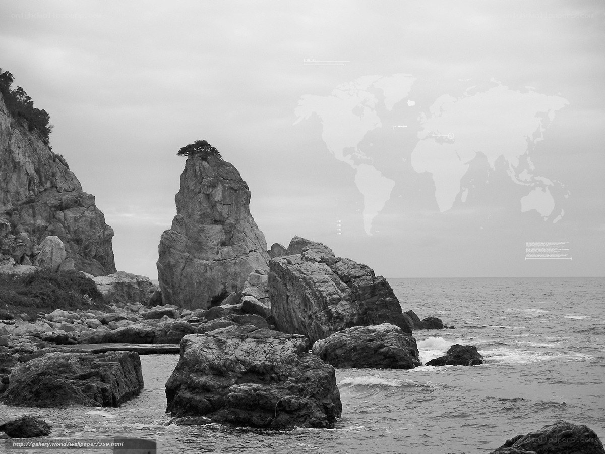 Rocky coastline with world map overlay