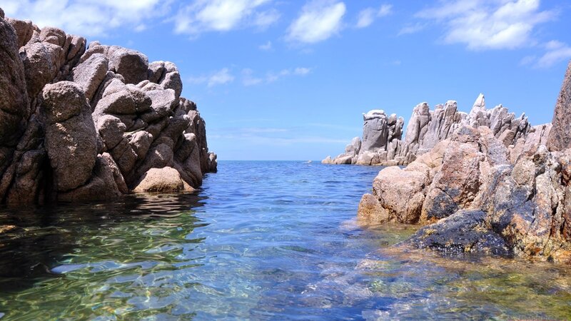 rocky cove with clear water