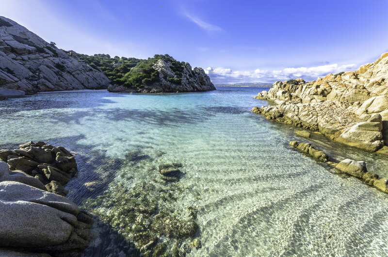Rocky Cove with Clear Water — Blue, Serene, Afternoon, Photograph